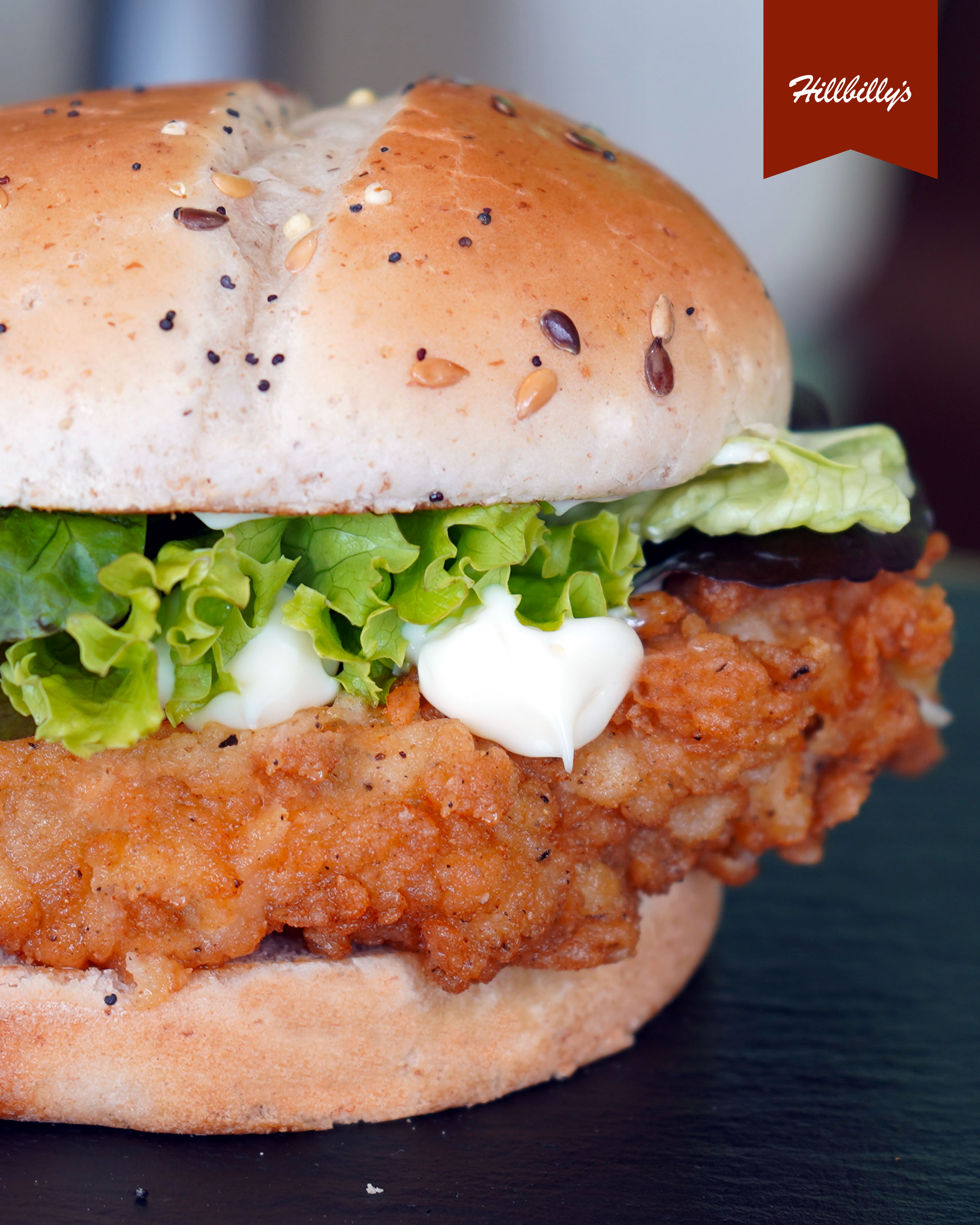 Hillbilly's Breast in a Bun with fried chicken, lettuce and mayonnaise